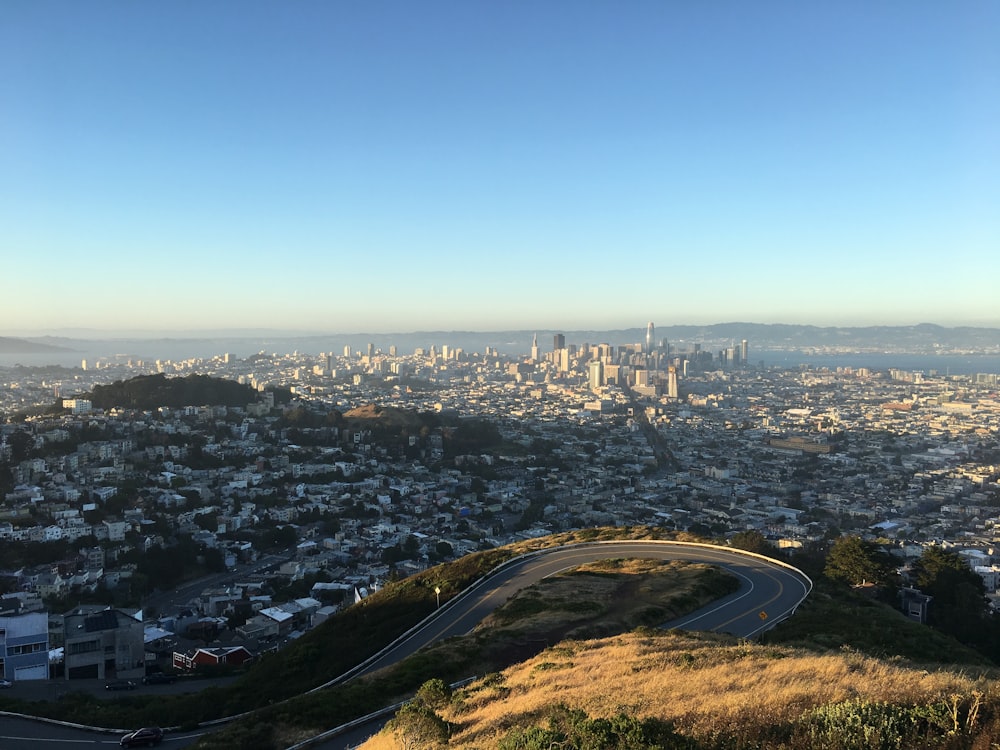 city skyline under blue sky during daytime