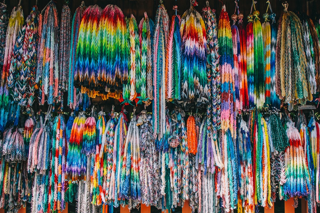 blue green and red textile,