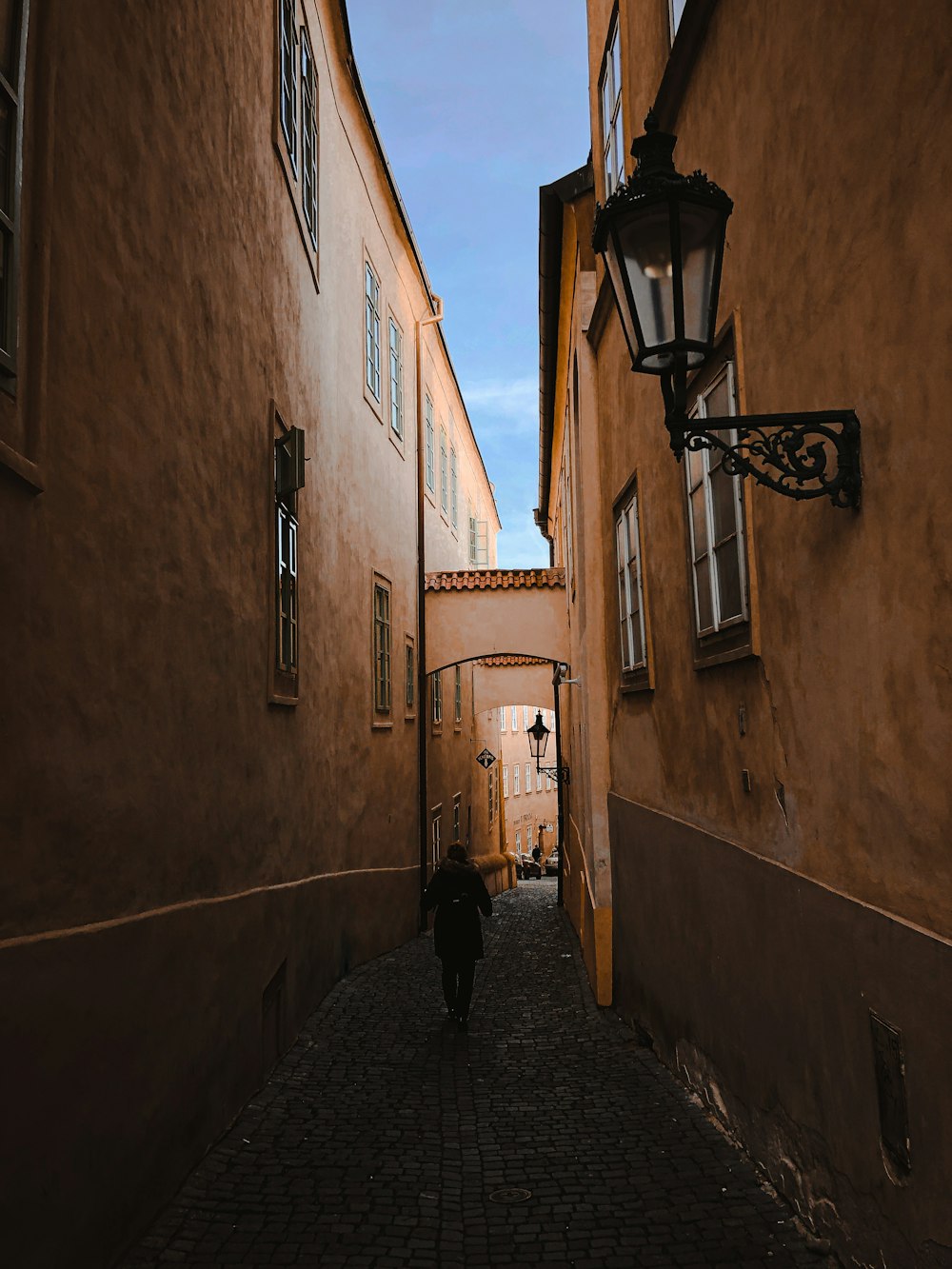 person walking on street during daytime