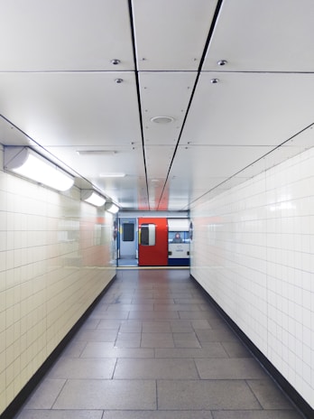 Stylish storage lockers inside a clean, well-lit NYC subway station.