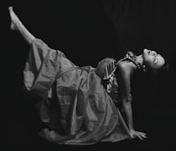 A dramatic fashion shot with bold contrasts and a powerful, modern attitude.