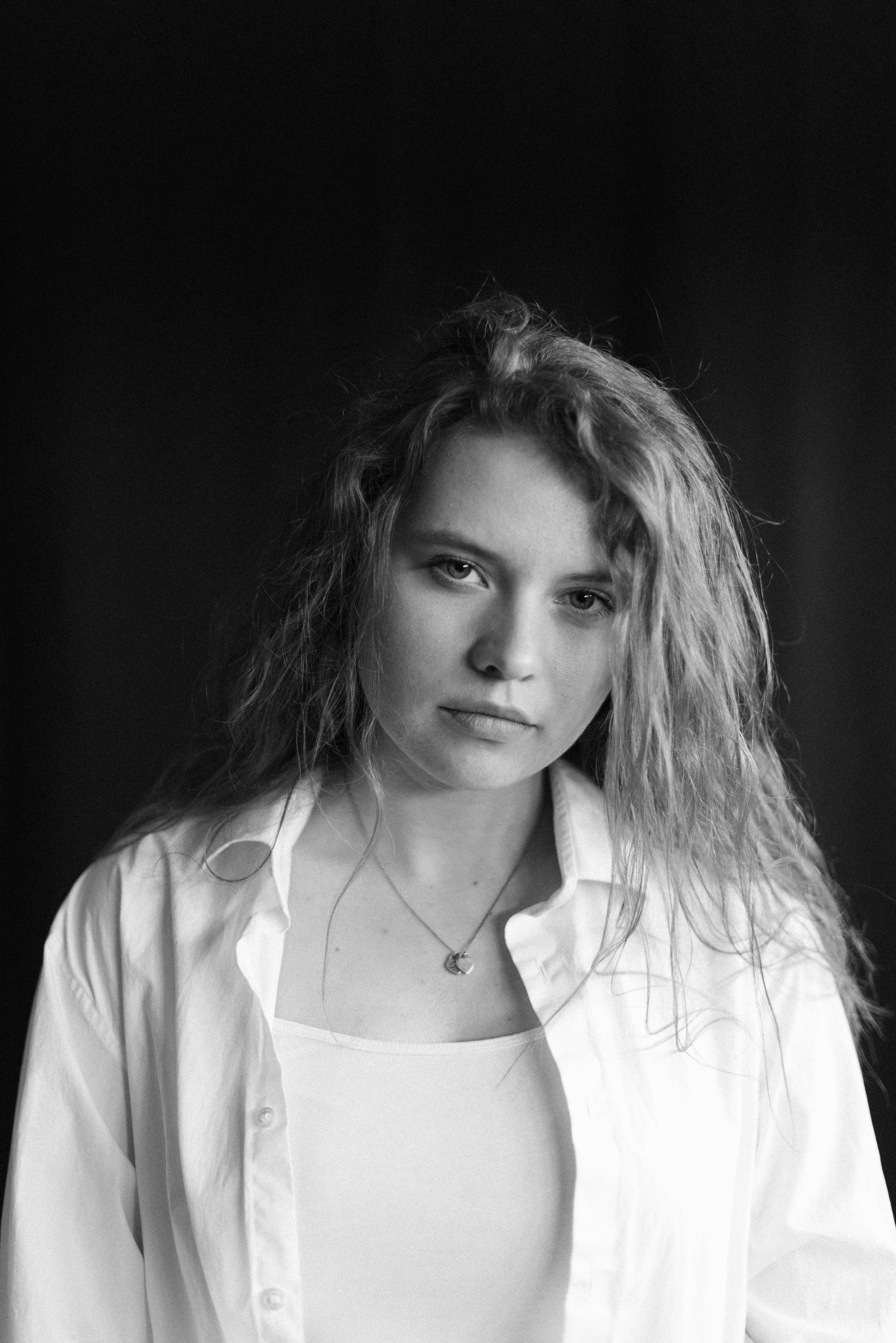 woman in white button up shirt