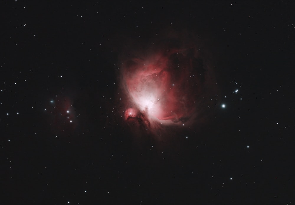 red and black galaxy with stars