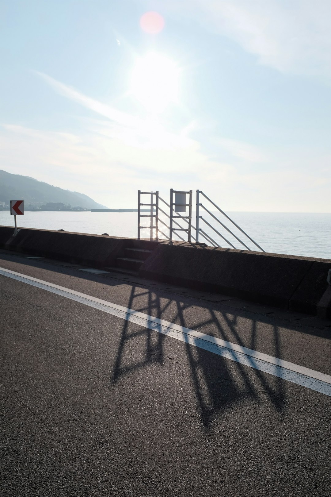 gray metal railings near sea during daytime