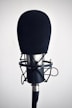 black and silver microphone on black stand
