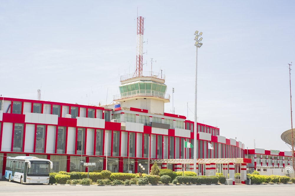 red and white concrete building during daytime