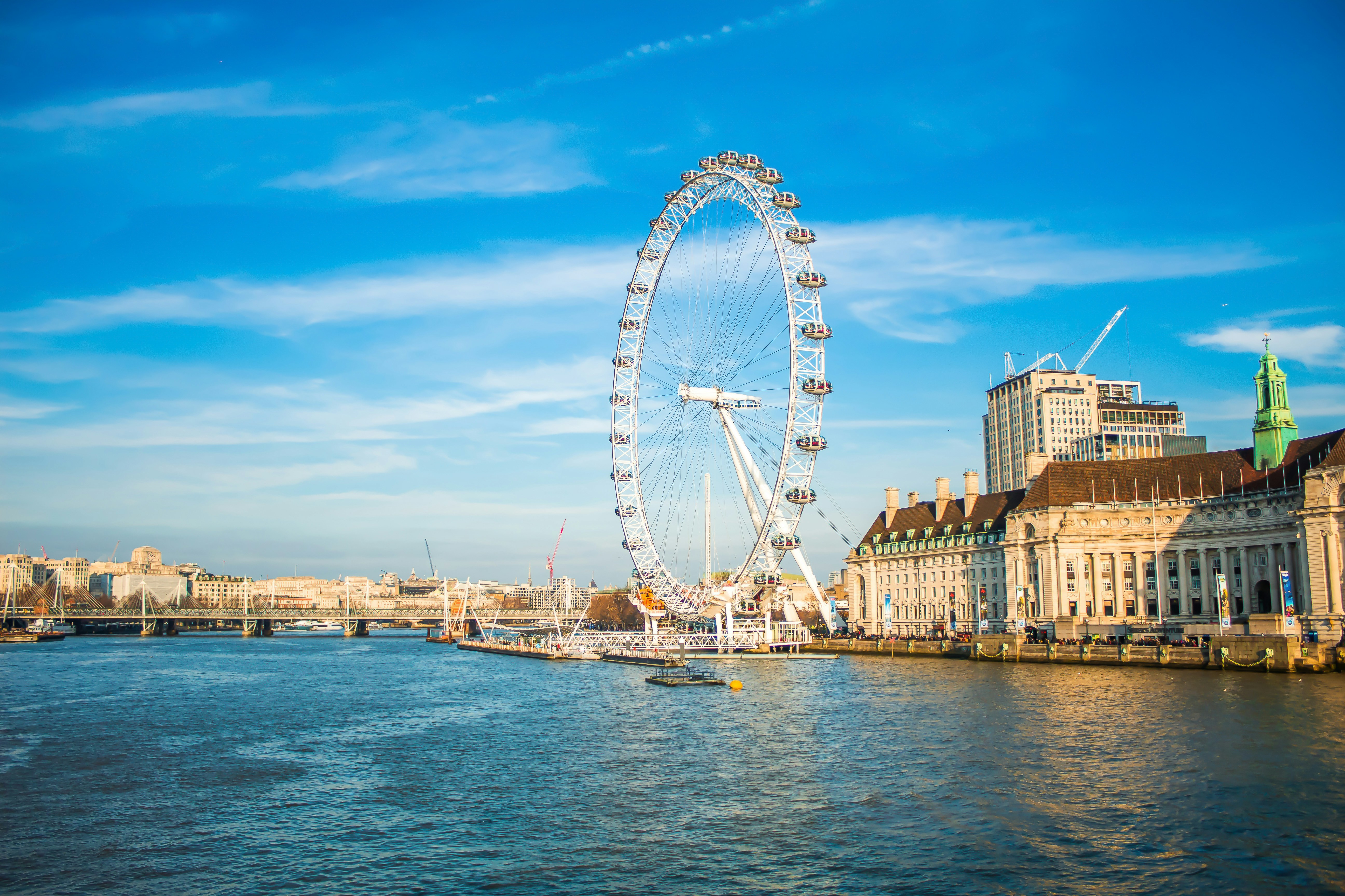 ferris wheel near body of water during daytime, 