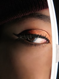 woman with red lipstick and white hijab