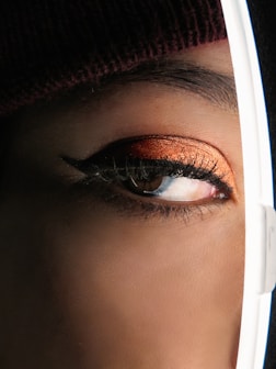 woman with red lipstick and white hijab