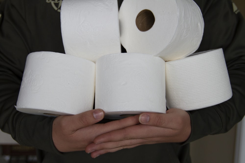person holding white toilet paper roll photo – Free toilet paper Image on  Unsplash