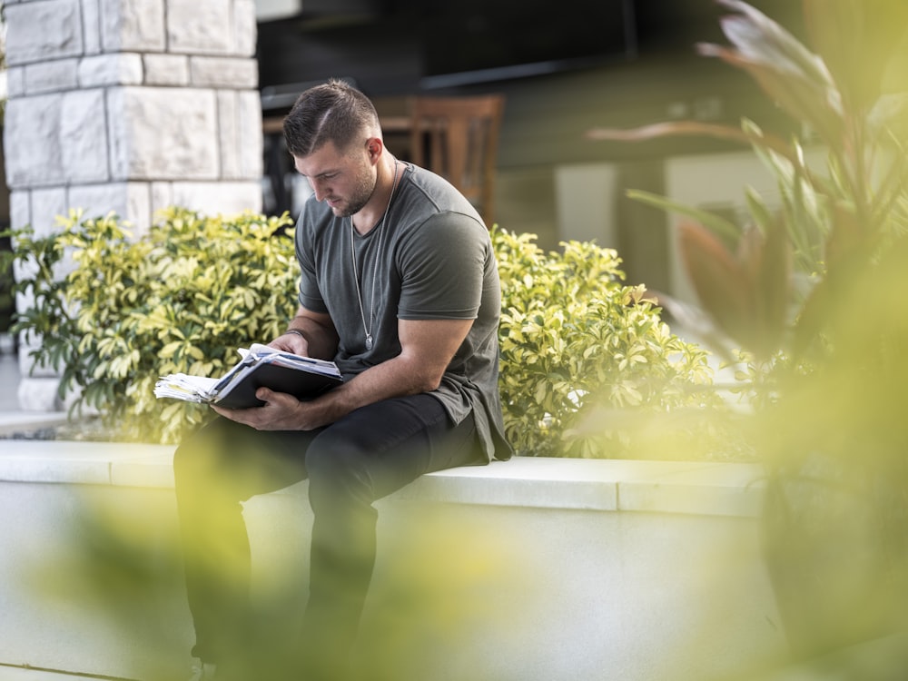 Tim Tebow reading a bible