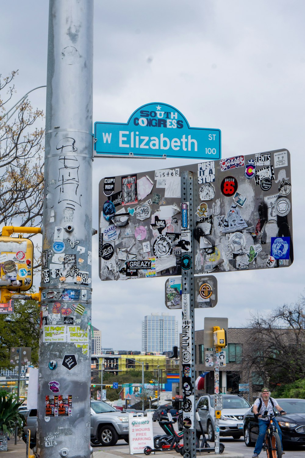 white blue and black street sign