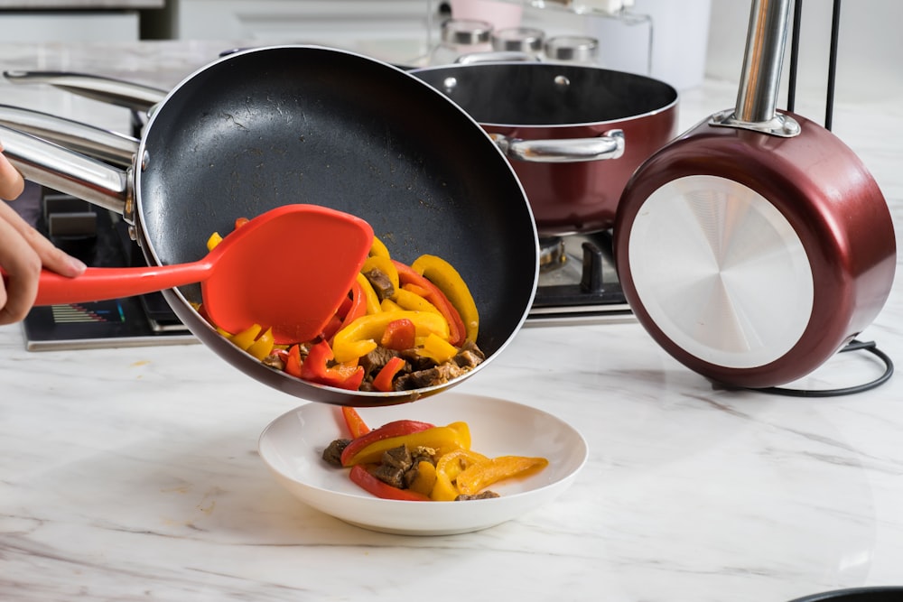 sliced fruit on black frying pan