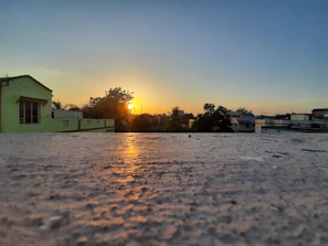 A sunset shot highlighting one of our properties with glowing windows and serene ambiance