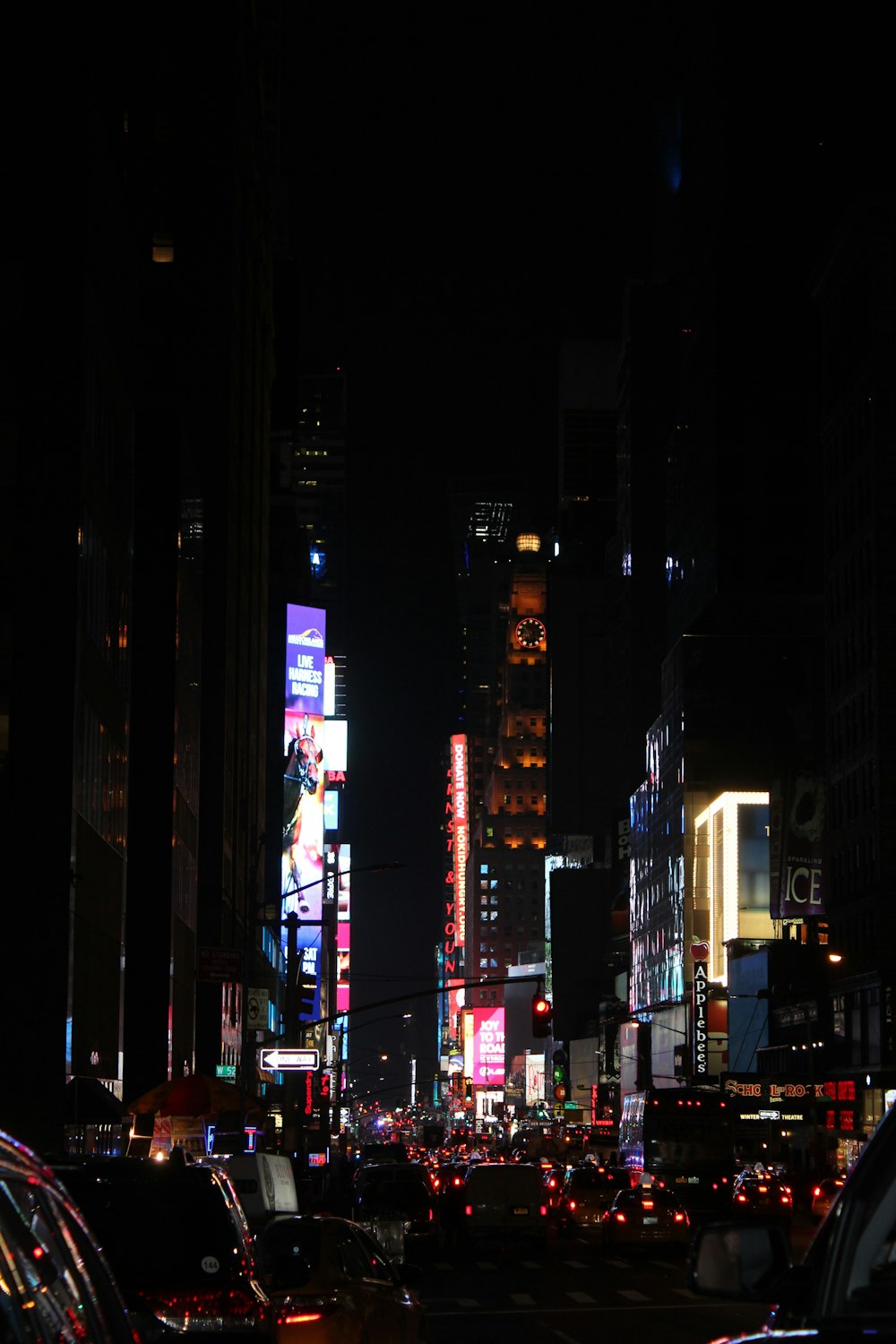 people walking on street during night time