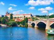 white bridge over river during daytime