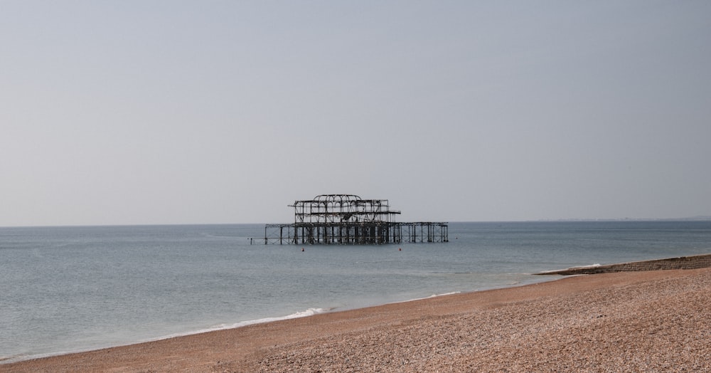 brown wooden dock on sea during daytime