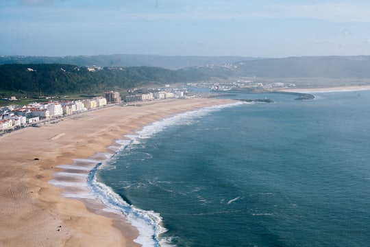 aerial view of beach during daytime in Miradouro do Suberco Portugal