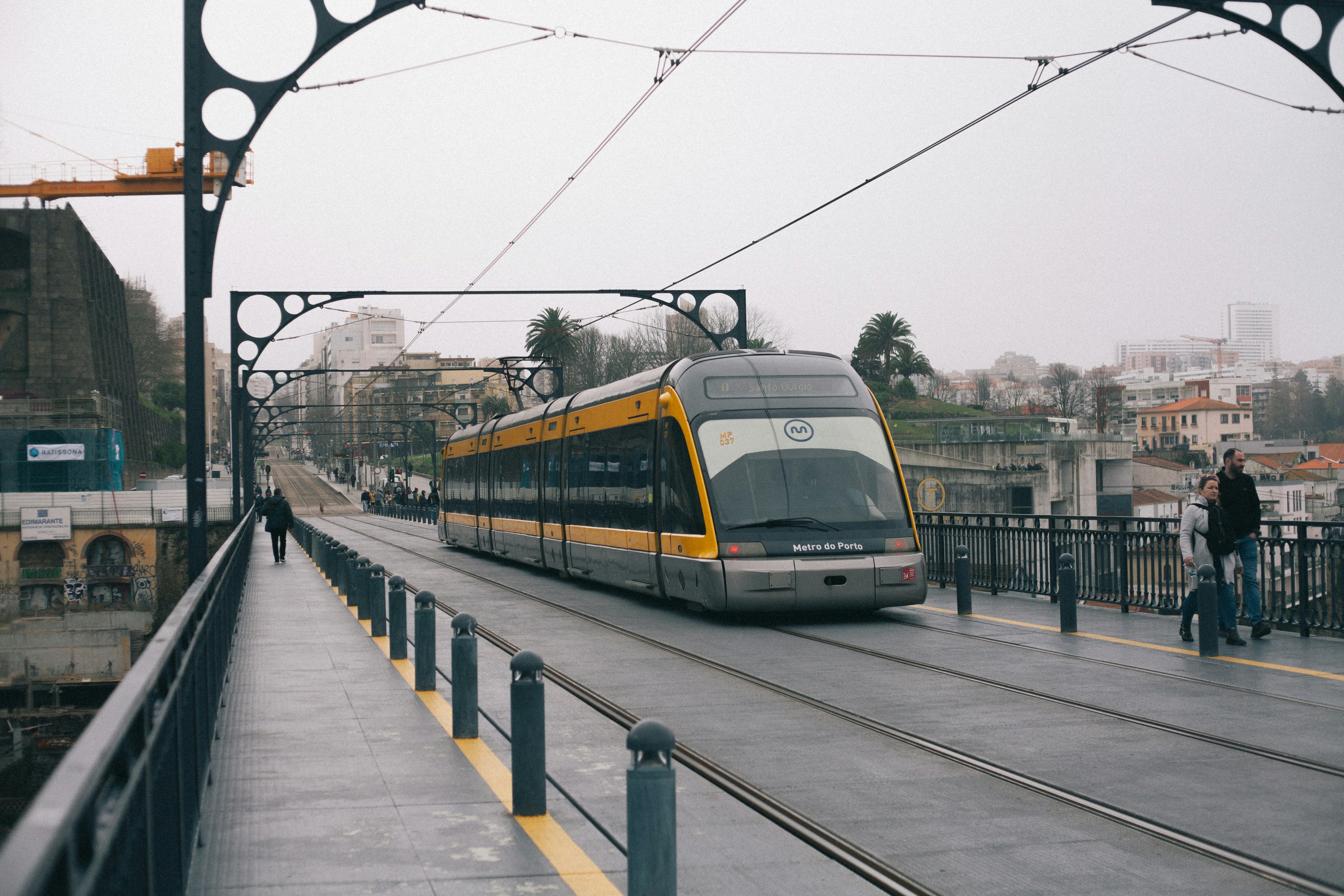 white and gray train on rail during daytime