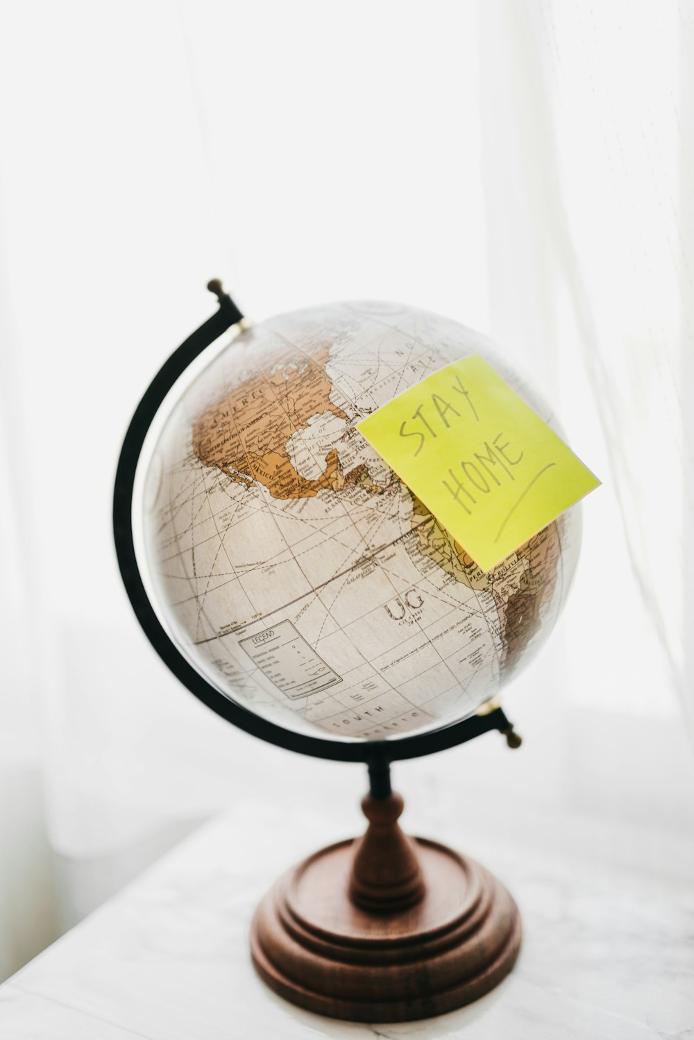 brown and black desk globe