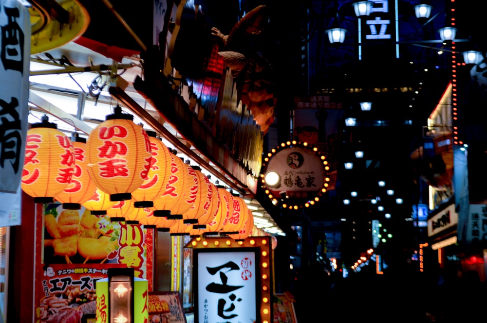 people walking on street during night time