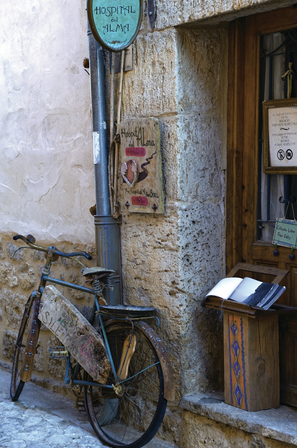 brown commuter bike beside brown wooden cabinet