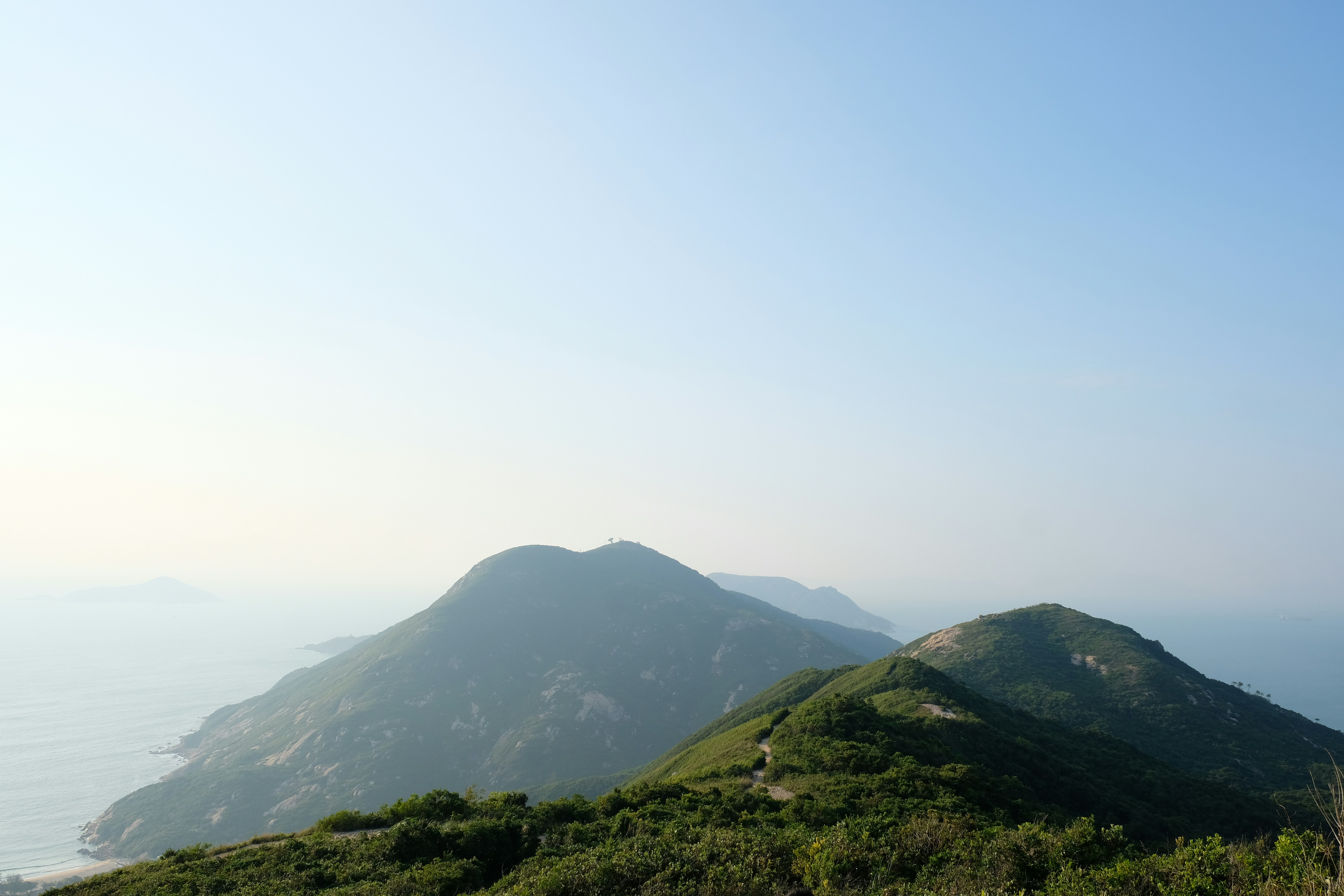 green mountain under white sky during daytime