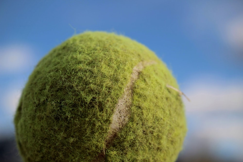 green tennis ball under blue sky during daytime