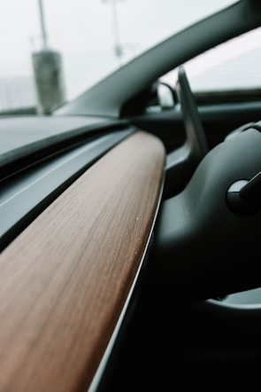 An interior view of a luxury vehicle with minimalist design.