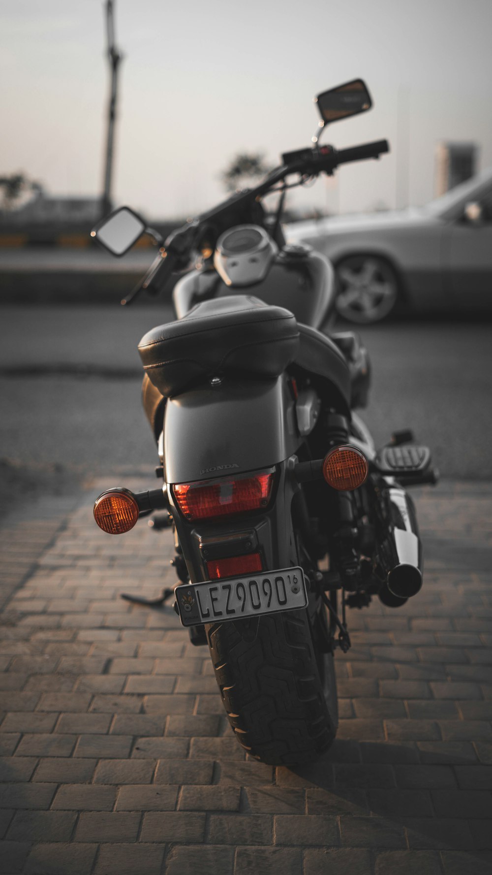 black and red motorcycle on road during daytime