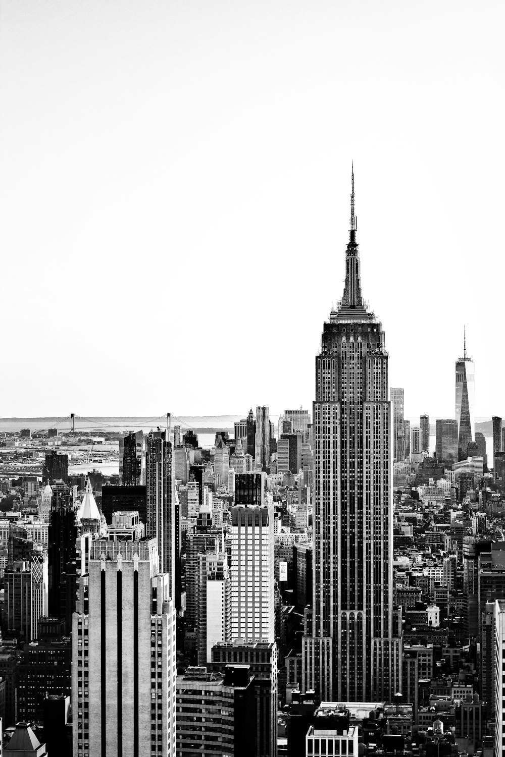 grayscale photo of city buildings