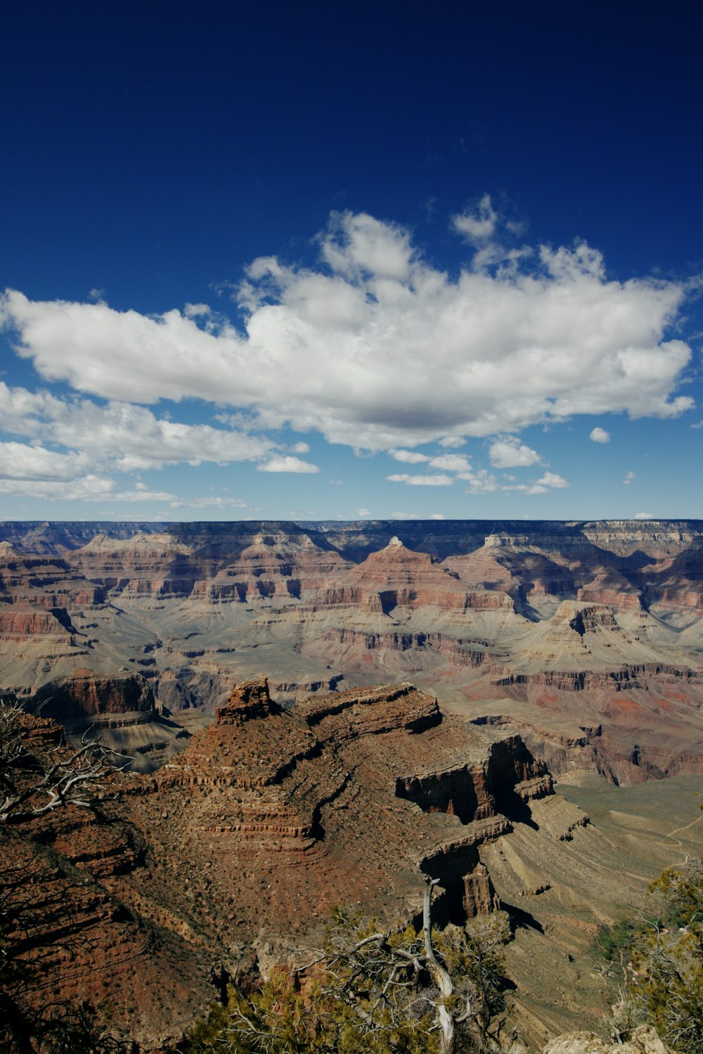 brown rocky mountain under blue sky during daytime