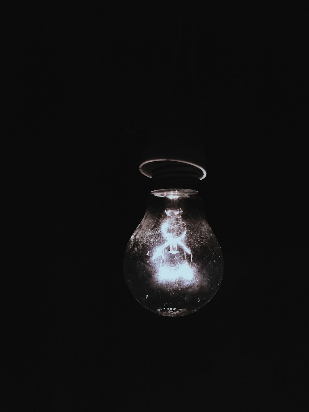 clear glass jar with black background