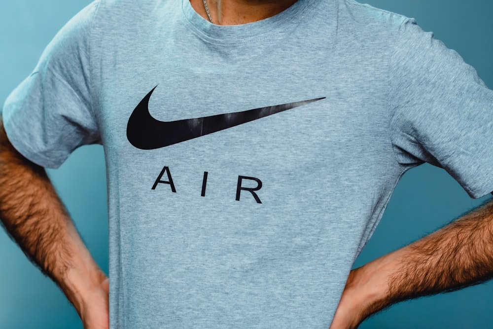 man in white nike crew neck t-shirt