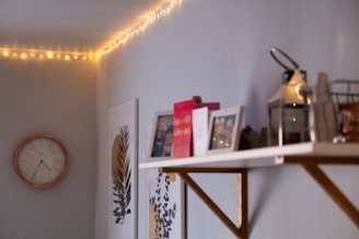 red and white box on white wooden shelf