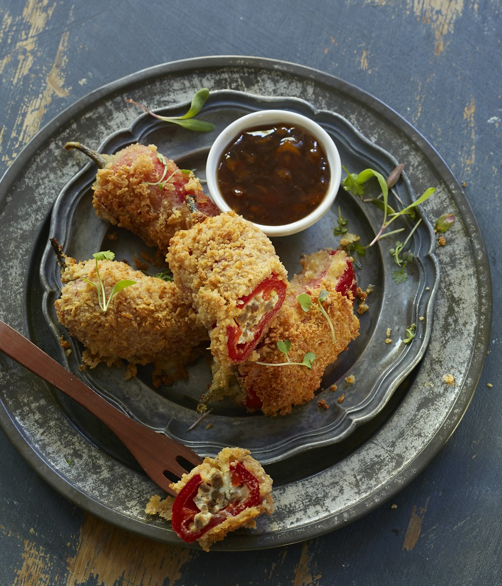 fried chicken on clear glass plate