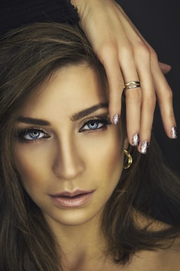 woman with cosmetics and manicured nails