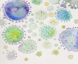 Watercolor illustration depicting various abstract, circular shapes resembling microscopic views of viruses or cells in shades of green, blue, and purple.