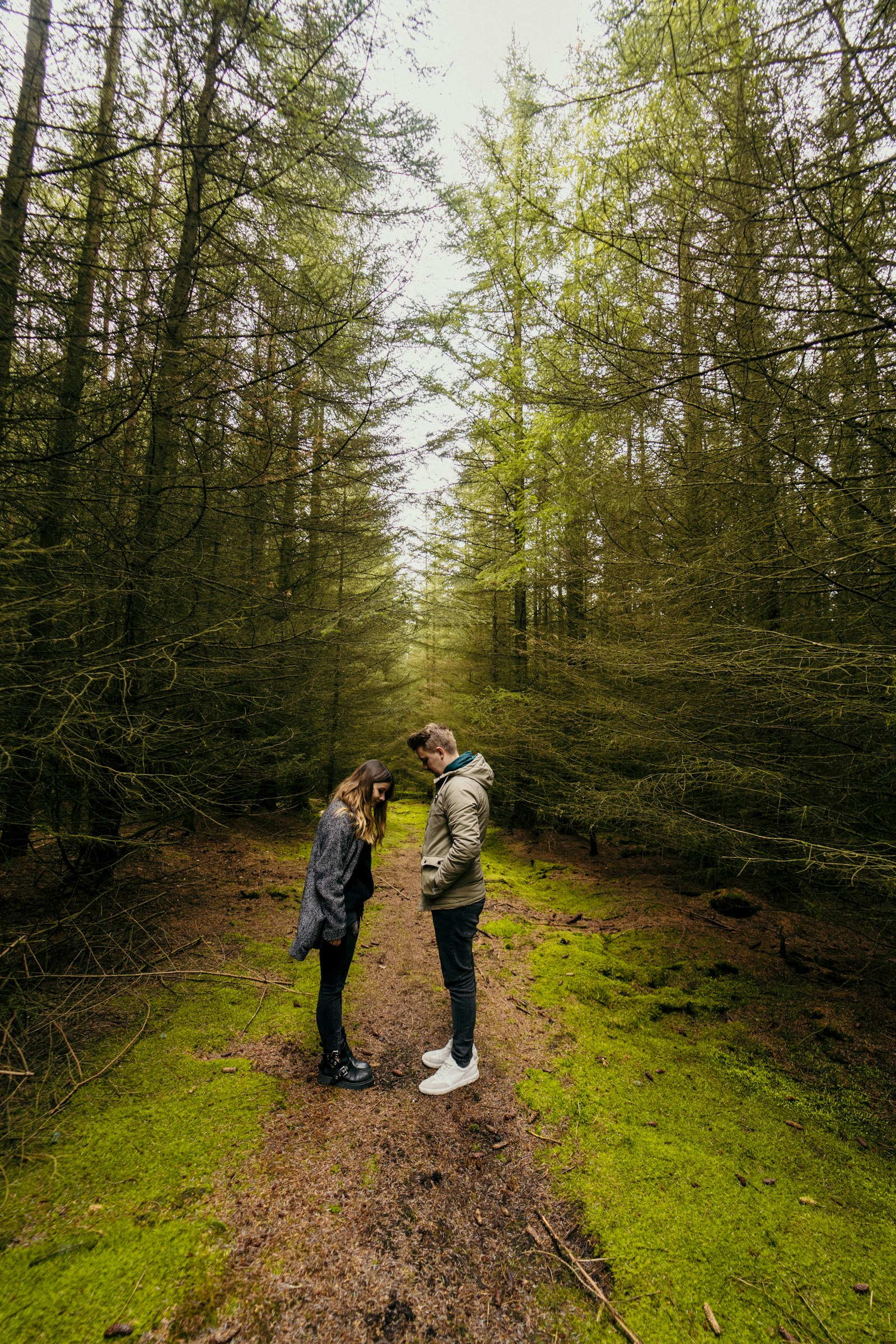 Sony a7 II + Samyang AF 14mm F2.8 FE sample photo. Man and woman walking photography