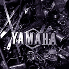 a pile of metal parts with the word yamaha on them
