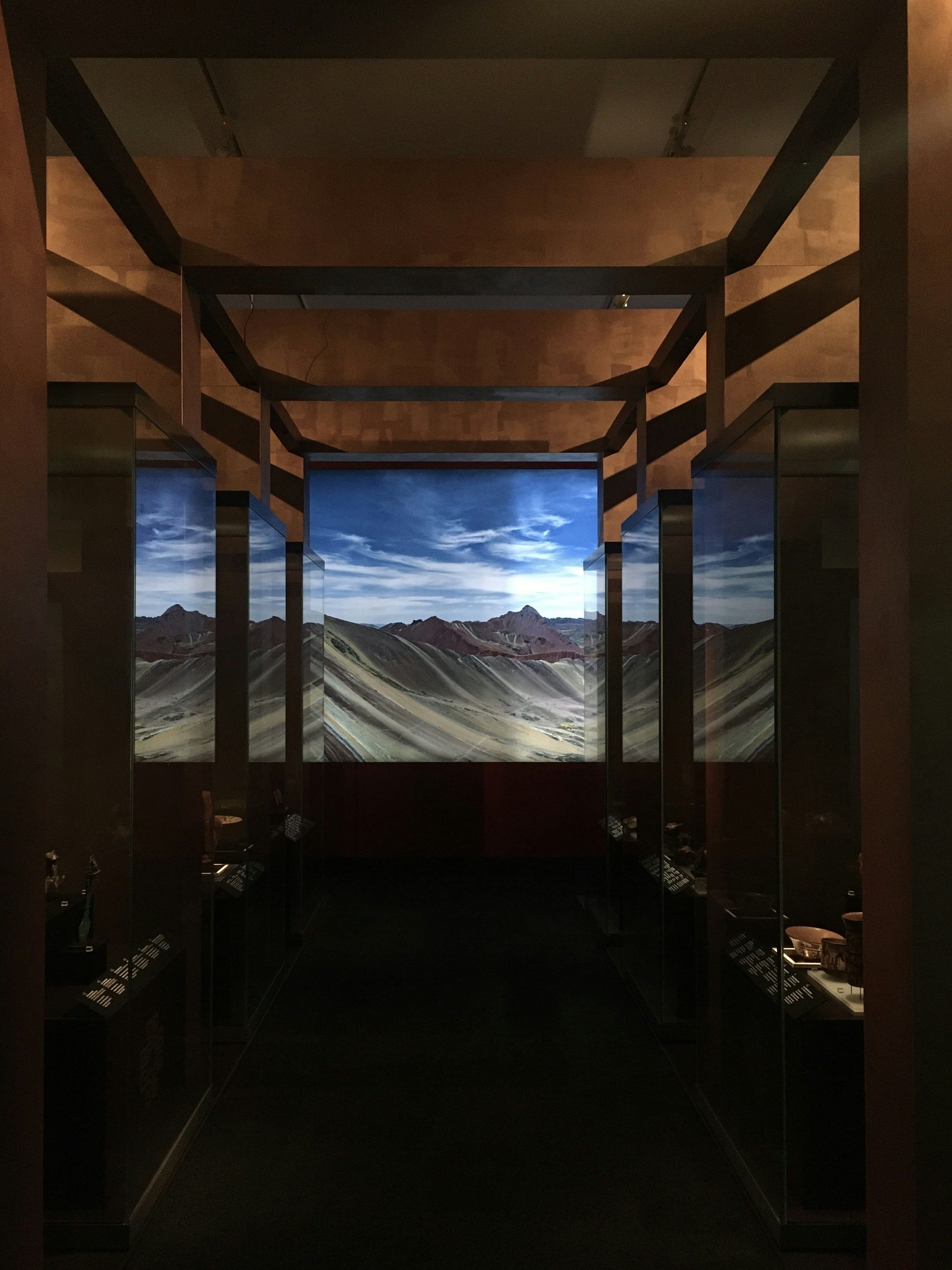 black flat screen tv turned on near window