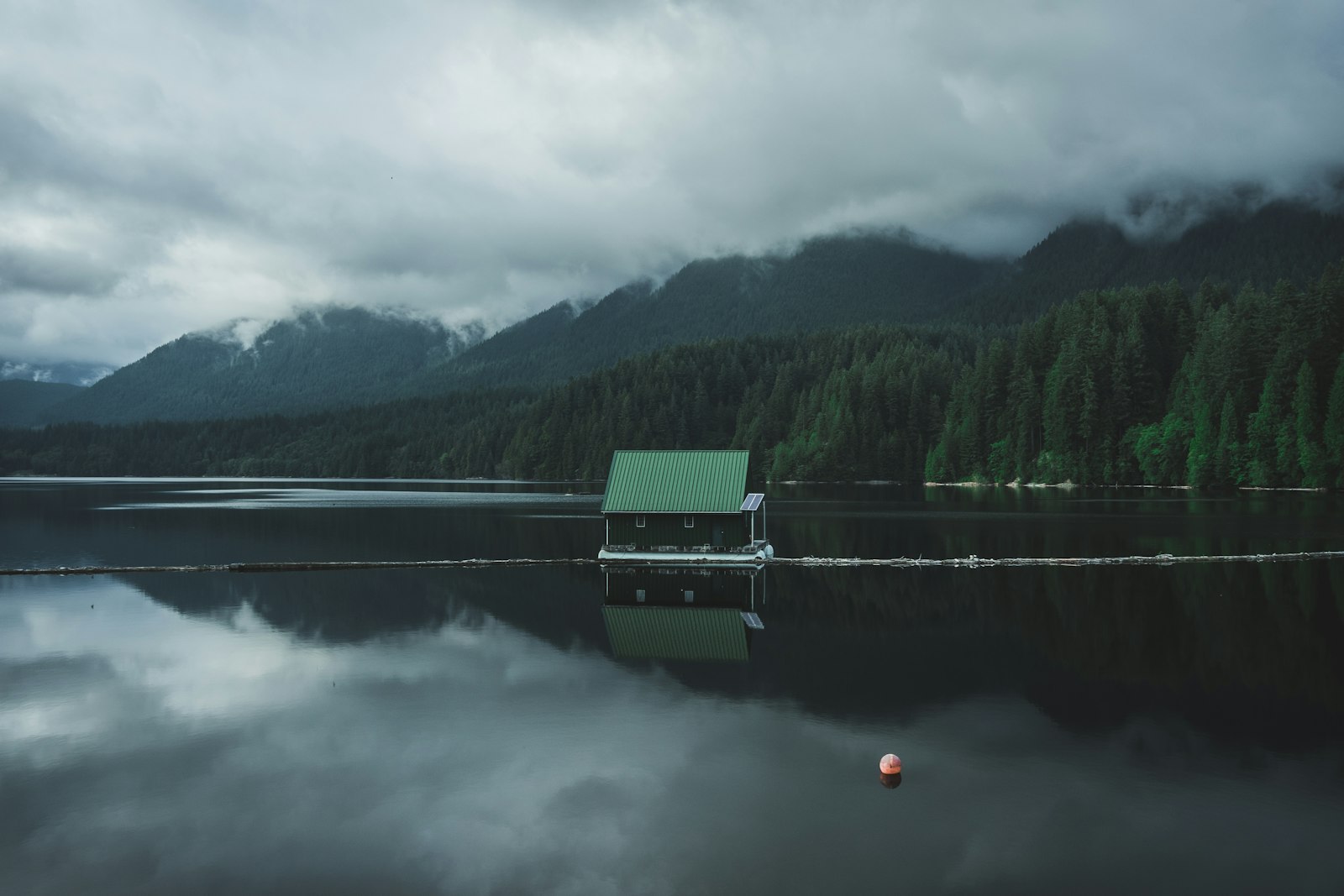 Sony a7R + Sigma 19mm F2.8 EX DN sample photo. Green wooden boat on photography