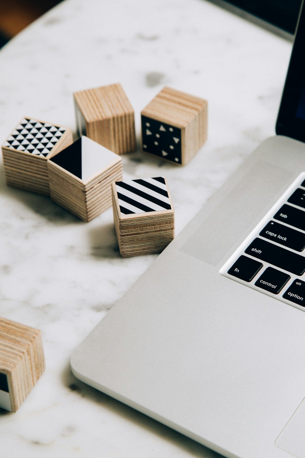 brown wooden blocks on white table