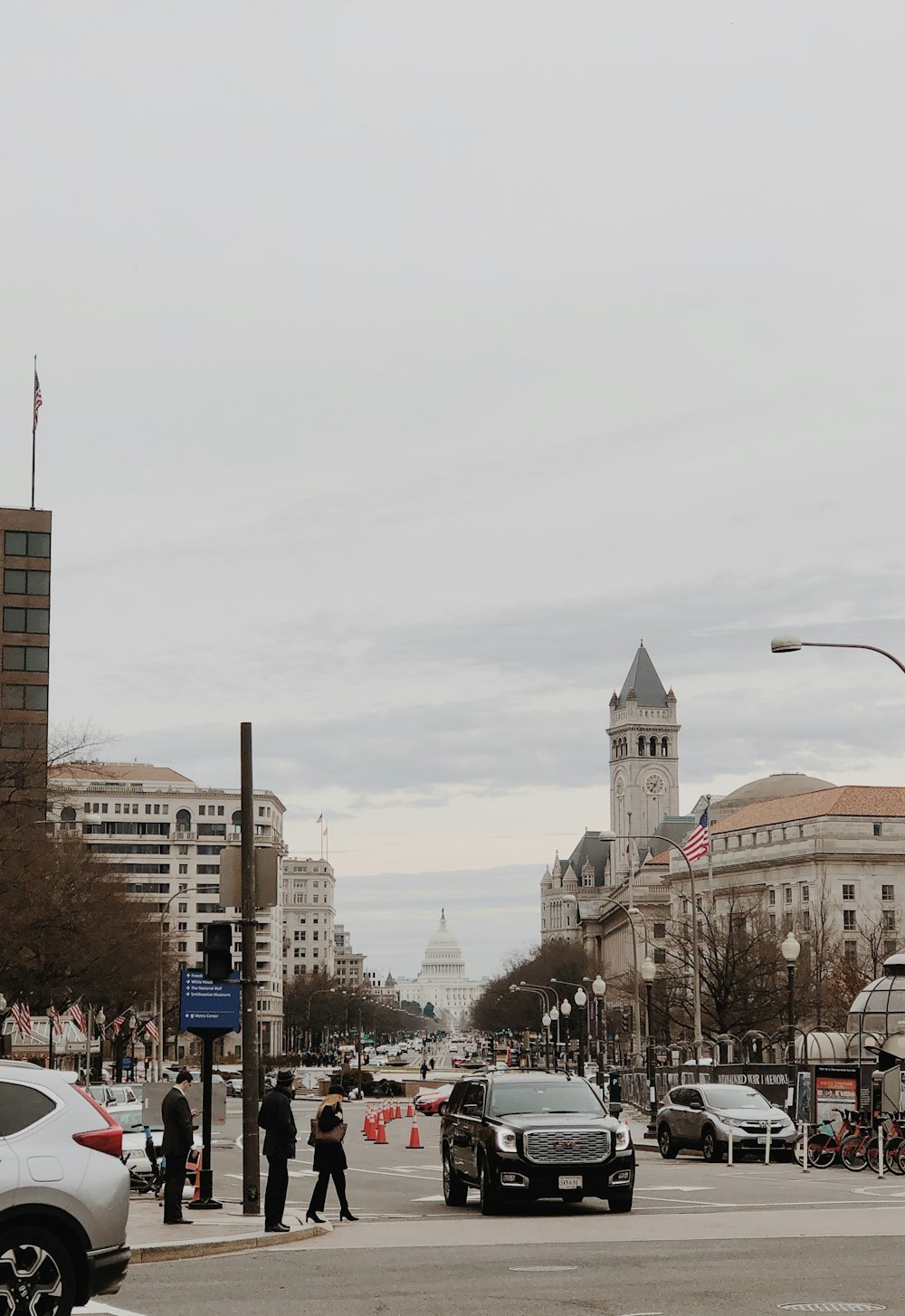 people walking on street near buildings during daytime