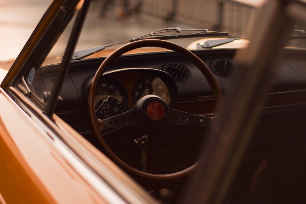 black and brown steering wheel