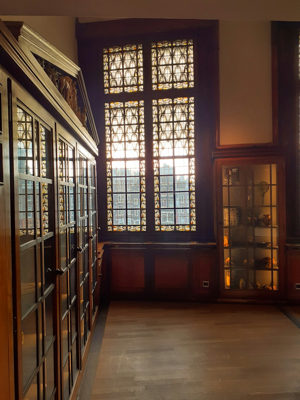 brown wooden framed glass windows