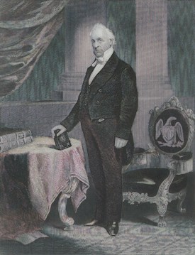 An engraved portrait of a man wearing formal 19th-century attire, including a suit with a vest and bow tie. He stands beside an ornately carved chair featuring an eagle emblem. His left hand rests on a table draped with a patterned cloth and several large books. The background includes tall columns and heavy drapery.