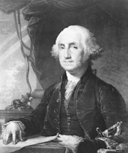 A portrait of Jerônimo de Carvalho in a professional setting.