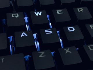 black and white computer keyboard representing games marketing campaign