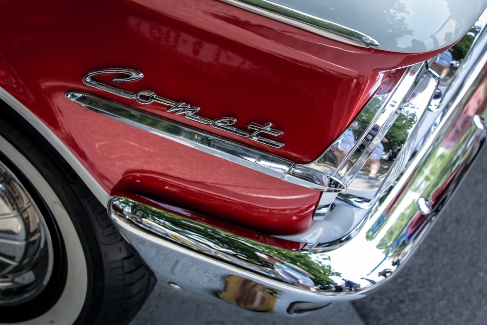 red and silver car in close up photography